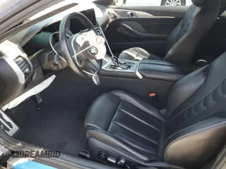 2024 BMW 8 Series 840i z VIN WBAAE4C05RCN32734, wystawiony jako Copart lot #51999545 z przebiegiem Nie podano mil oraz Szkody całkowita. Historia ofert i sprzedaży dostępna na DreamBid. Obrazek 7.