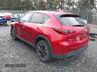 2023 Mazda CX-5 2.5 S Premium Package with VIN JM3KFBDM1P0161605, listed as a IAAI auction lot 41626777 with 26,581 mi miles. Bid and sale history available at carsss.com. Image 3.