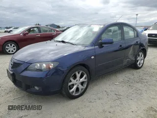 2009 Mazda 3 i Touring Value with VIN JM1BK32GX91253266, listed as a Copart auction lot 54777335 with 177,247 mi miles and Salvage Title. Bid and sale history available at DreamBid. Image 1.