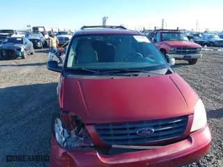 2005 Ford Freestar Wagon SES with VIN 2FMZA57645BA50977, listed as a IAAI auction lot 41540023 with 149,319 mi miles. Bid and sale history available at carsss.com. Image 12.