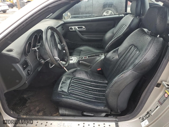 2004 Mercedes-Benz SLK-Class with VIN WDBKK49F34F306967, listed as a Copart auction lot 79557304 with 72,067 mi miles and Salvage Title. Bid and sale history available at carsss.com. Image 7.