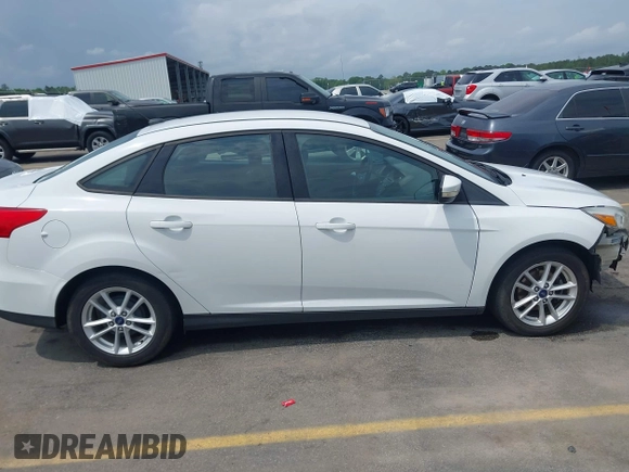 2015 Ford Focus SE with VIN 1FADP3F28FL204145, listed as a IAAI auction lot 42107720 with 129,441 mi miles and . Bid and sale history available at DreamBid. Image 14.