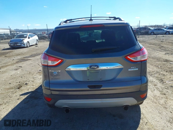 2013 Ford Escape SEL with VIN 1FMCU0HX2DUA51416, listed as a IAAI auction lot 41689474 with 140,596 mi miles and . Bid and sale history available at DreamBid. Image 17.
