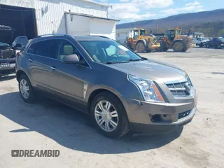2012 Cadillac SRX Luxury Collection with VIN 3GYFNDE36CS542006, listed as a IAAI auction lot 41976675 with 137,418 mi miles. Bid and sale history available at carsss.com. Image 1.
