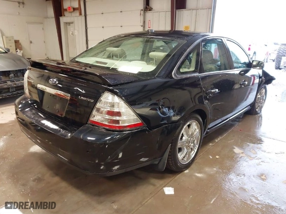 2008 Ford Taurus Limited with VIN 1FAHP25W78G110429, listed as a IAAI auction lot 41303655 with 67,648 mi miles. Bid and sale history available at carsss.com. Image 4.