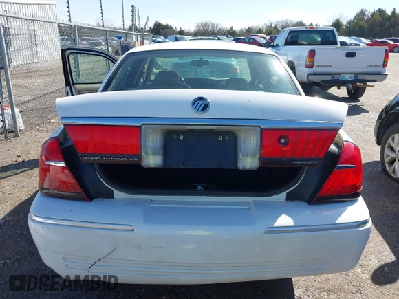 2002 Mercury Grand Marquis LS Premium z VIN 2MEFM75W92X641347, wystawiony jako IAAI lot #41701179 z przebiegiem 79 942 mil mil oraz . Historia ofert i sprzedaży dostępna na DreamBid. Obrazek 16.
