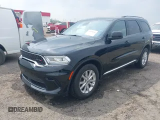 2023 Dodge Durango SXT Launch Edition with VIN 1C4RDJAG0PC584678, listed as a IAAI auction lot 42194281 with 34,013 mi miles and . Bid and sale history available at DreamBid. Image 2.