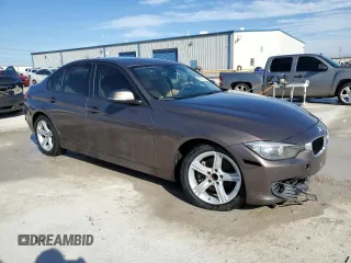 2015 BMW 3 Series 328i with VIN WBA3A5G58FNS88853, listed as a Copart auction lot 42785375 with 129,918 mi miles and Salvage title. Bid and sale history available at DreamBid. Image 4.