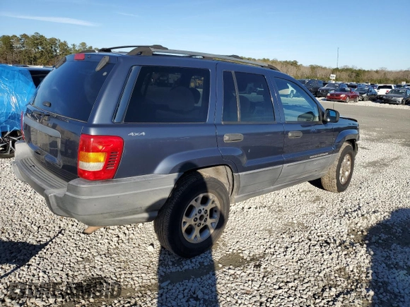 2001 Jeep Grand Cherokee Laredo z VIN 1J4GW48S91C578800, wystawiony jako Copart lot #87934695 z przebiegiem 250 784 mil mil oraz Szkoda całkowita • Salvage title. Historia ofert i sprzedaży dostępna na DreamBid. Obrazek 3.