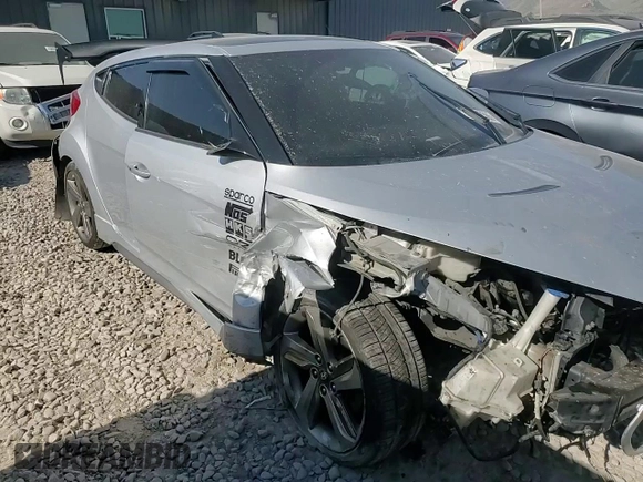 2015 Hyundai Veloster Turbo z VIN KMHTC6AE4FU221891, wystawiony jako Copart lot #58857565 z przebiegiem 144 671 mil mil oraz Szkoda całkowita • Salvage title. Historia ofert i sprzedaży dostępna na DreamBid. Obrazek 12.