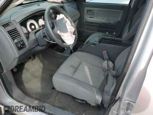 2007 Dodge Dakota ST z VIN 1D7HW28PX7S265270, wystawiony jako Copart lot #78265494 z przebiegiem 154 418 mil mil oraz Szkoda całkowita • Salvage title. Historia ofert i sprzedaży dostępna na DreamBid. Obrazek 7.