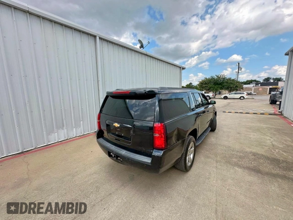 2015 Chevrolet Suburban LT with VIN 1GNSKJKC3FR153922, listed as a Copart auction lot 64337945 with 238,441 mi miles and Clean title. Bid and sale history available at DreamBid. Image 4.