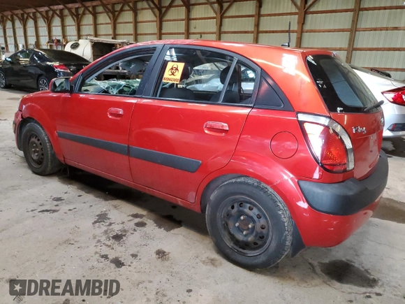 2009 Kia Rio LX with VIN KNADE243696572877, listed as a Copart auction lot 66075394 with 0 mi miles and Non Repairable. Bid and sale history available at carsss.com. Image 2.
