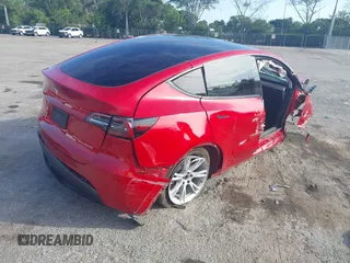 2021 Tesla Model Y Long Range z VIN 5YJYGAEE3MF184396, wystawiony jako IAAI lot #42321116 z przebiegiem Nie podano mil oraz . Historia ofert i sprzedaży dostępna na DreamBid. Obrazek 4.