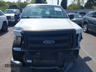 2014 Ford F-150 XL with VIN 1FTMF1CM9EKD53806, listed as a IAAI auction lot 42137550 with 138,888 mi miles and . Bid and sale history available at carsss.com. Image 6.