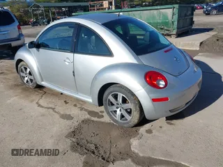 2006 Volkswagen New Beetle Coupe with VIN 3VWRG31CX6M406075, listed as a IAAI auction lot 41799188 with 88,271 mi miles. Bid and sale history available at carsss.com. Image 3.
