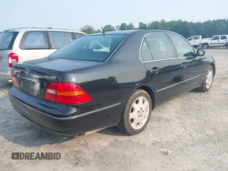 2003 Lexus LS 430 z VIN JTHBN30F530104857, wystawiony jako IAAI lot #42410515 z przebiegiem 224 329 mil mil oraz . Historia ofert i sprzedaży dostępna na DreamBid. Obrazek 4.