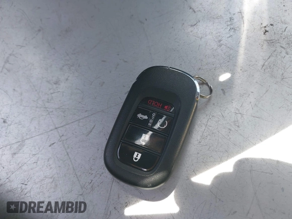 2023 Honda Civic Touring with VIN 2HGFE1F94PH323451, listed as a IAAI auction lot 42383422 with 6,120 mi miles and . Bid and sale history available at DreamBid. Image 11.