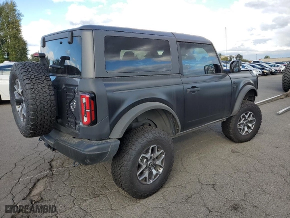 2023 Ford Bronco with VIN 1FMDE5CP1PLA92944, listed as a Copart auction lot 66625304 with 115,179 mi miles and Salvage Title. Bid and sale history available at carsss.com. Image 3.