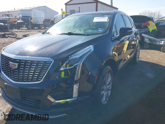 2021 Cadillac XT5 FWD Premium Luxury z VIN 1GYKNCRS2MZ141440, wystawiony jako IAAI lot #41874409 z przebiegiem 76 911 mil mil oraz . Historia ofert i sprzedaży dostępna na DreamBid. Obrazek 17.