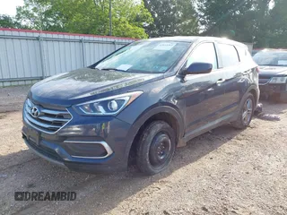2018 Hyundai Santa Fe 2.4L with VIN 5NMZT3LB2JH092677, listed as a IAAI auction lot 42033763 with 158,039 mi miles and . Bid and sale history available at DreamBid. Image 18.