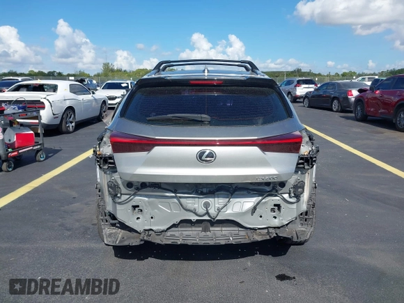 2022 Lexus UX 200 F Sport z VIN JTHE3JBH9N2048306, wystawiony jako IAAI lot #42516590 z przebiegiem 73 139 mil mil oraz . Historia ofert i sprzedaży dostępna na DreamBid. Obrazek 6.