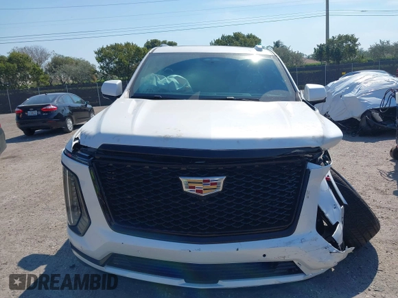 2025 Cadillac Escalade z VIN 1GYS9GRL7SR168408, wystawiony jako IAAI lot #41855623 z przebiegiem 1 744 mil mil oraz . Historia ofert i sprzedaży dostępna na DreamBid. Obrazek 12.