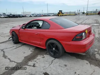 1996 Ford Mustang GT with VIN 1FALP42X4TF131093, listed as a Copart auction lot 61013915 with 158,297 mi miles and Salvage title. Bid and sale history available at DreamBid. Image 2.