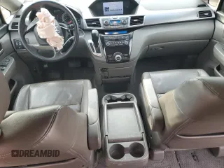 2012 Honda Odyssey EX-L with VIN 5FNRL5H60CB117376, listed as a Copart auction lot 50740725 with 163,716 mi miles and Salvage Title. Bid and sale history available at DreamBid. Image 8.