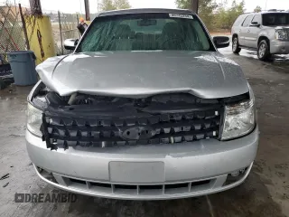 2009 Ford Taurus Limited with VIN 1FAHP25W09G100990, listed as a Copart auction lot 80745234 with 129,692 mi miles and Salvage Title. Bid and sale history available at carsss.com. Image 5.