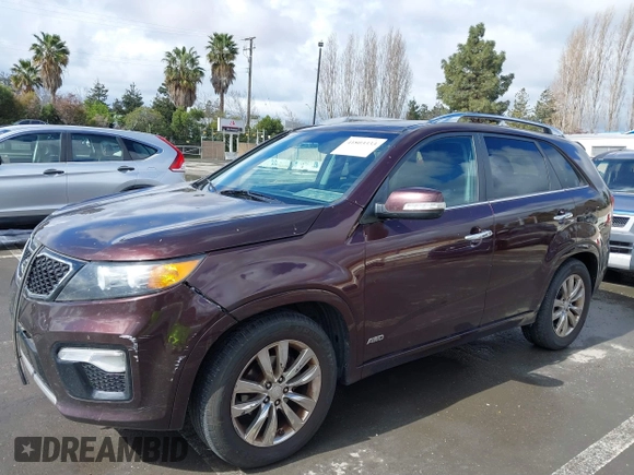 2012 Kia Sorento SX z VIN 5XYKWDA25CG283654, wystawiony jako IAAI lot #41803333 z przebiegiem 271 807 mil mil oraz . Historia ofert i sprzedaży dostępna na DreamBid. Obrazek 6.