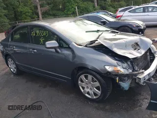 2009 Honda Civic LX z VIN 19XFA16589E023563, wystawiony jako IAAI lot #42353383 z przebiegiem 269 264 mil mil oraz . Historia ofert i sprzedaży dostępna na DreamBid. Obrazek 1.