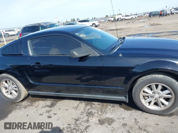 2008 Ford Mustang Deluxe with VIN 1ZVHT80N085138945, listed as a IAAI auction lot 41820988 with 127,880 mi miles. Bid and sale history available at carsss.com. Image 13.
