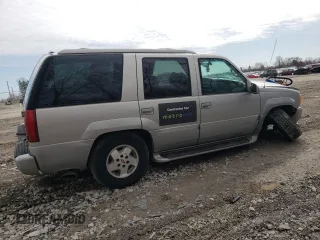 1999 GMC Denali with VIN 1GKEK13R0XR915053, listed as a Copart auction lot 49241145 with 2,664,121 mi miles and Salvage Title. Bid and sale history available at carsss.com. Image 3.