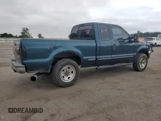 1999 Ford F-250 XL with VIN 1FTNX20FXXEA40858, listed as a Copart auction lot 63296925 with 368,565 mi miles and Salvage title. Bid and sale history available at DreamBid. Image 3.