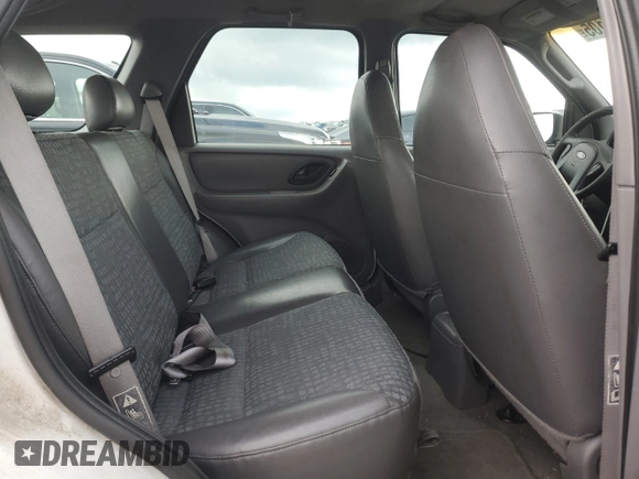 2001 Ford Escape XLS with VIN 1FMYU02161KB01283, listed as a Copart auction lot 59145105 with 86,195 mi miles and Salvage title. Bid and sale history available at DreamBid. Image 11.