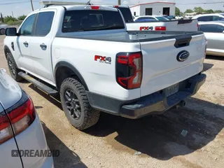 2024 Ford Ranger XLT with VIN 1FTER4HH8RLE21828, listed as a IAAI auction lot 42205087 with 61,159 mi miles and . Bid and sale history available at DreamBid. Image 3.
