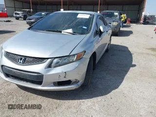 2012 Honda Civic Cpe LX with VIN 2HGFG3B52CH549698, listed as a IAAI auction lot 41818647 with 100,975 mi miles. Bid and sale history available at carsss.com. Image 6.