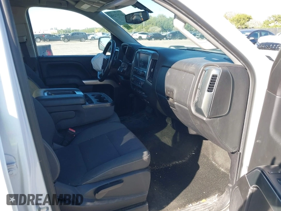 2018 Chevrolet Silverado 1500 LT with VIN 1GCRCREC1JZ153165, listed as a IAAI auction lot 41737258 with 130,475 mi miles and . Bid and sale history available at DreamBid. Image 5.