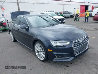 2018 Audi A4 Prestige z VIN WAUFNAF45JA019132, wystawiony jako IAAI lot #42239810 z przebiegiem 63 002 mil mil oraz . Historia ofert i sprzedaży dostępna na DreamBid. Obrazek 1.