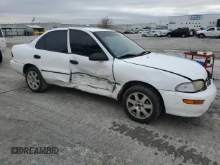 1996 Geo Prizm z VIN 1Y1SK5263TZ061291, wystawiony jako Copart lot #85366554 z przebiegiem 211 051 mil mil oraz Szkody całkowita. Historia ofert i sprzedaży dostępna na DreamBid. Obrazek 4.