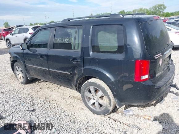 2013 Honda Pilot Touring with VIN 5FNYF3H93DB031630, listed as a IAAI auction lot 42237899 with 198,523 mi miles and . Bid and sale history available at DreamBid. Image 3.