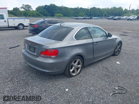2011 BMW 1 Series 128i with VIN WBAUP9C57BVL90171, listed as a IAAI auction lot 42801051 with 150,148 mi miles and . Bid and sale history available at DreamBid. Image 4.