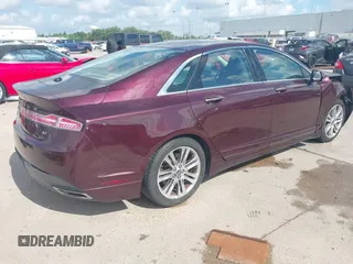 2013 Lincoln MKZ z VIN 3LN6L2GK2DR808761, wystawiony jako IAAI lot #42562086 z przebiegiem 124 087 mil mil oraz . Historia ofert i sprzedaży dostępna na DreamBid. Obrazek 4.