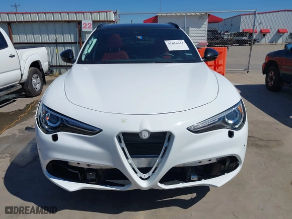 2023 Alfa Romeo Stelvio Ti with VIN ZASPAKBN4P7D63524, listed as a IAAI auction lot 41626631 with 37,731 mi miles. Bid and sale history available at carsss.com. Image 13.