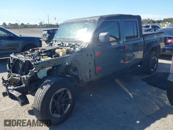 2021 Jeep Gladiator Willys with VIN 1C6HJTAG4ML517715, listed as a IAAI auction lot 41436634 with 21,187 mi miles and . Bid and sale history available at DreamBid. Image 18.