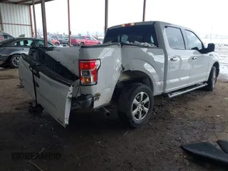 2019 Ford F-150 XL with VIN 1FTEW1CP7KKC75312, listed as a IAAI auction lot 41271422 with 135,228 mi miles and . Bid and sale history available at carsss.com. Image 4.