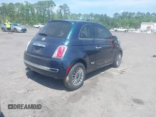 2013 FIAT 500 Lounge with VIN 3C3CFFCR6DT663496, listed as a IAAI auction lot 42030837 with 68,904 mi miles and . Bid and sale history available at DreamBid. Image 4.