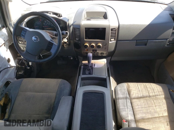 2004 Nissan Titan SE z VIN 1N6AA06A54N529628, wystawiony jako Copart lot #61020005 z przebiegiem 258 224 mil mil oraz Czysty tytuł • Clean title. Historia ofert i sprzedaży dostępna na DreamBid. Obrazek 8.