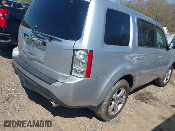 2013 Honda Pilot EX-L with VIN 5FNYF3H59DB022797, listed as a IAAI auction lot 41880675 with 206,359 mi miles and . Bid and sale history available at DreamBid. Image 4.
